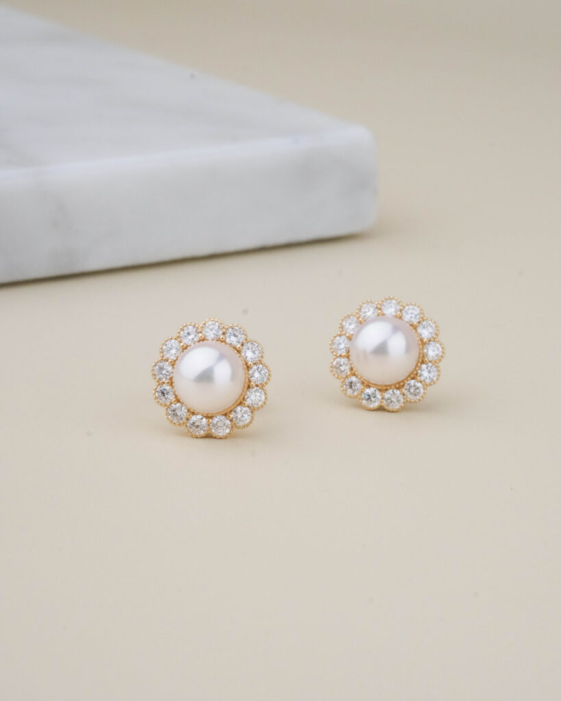 Pearl studs earrings with diamond halo
