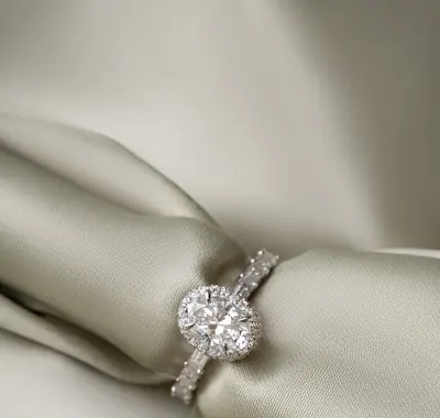 Oval Cut Solitaire Ring with Classic Halo